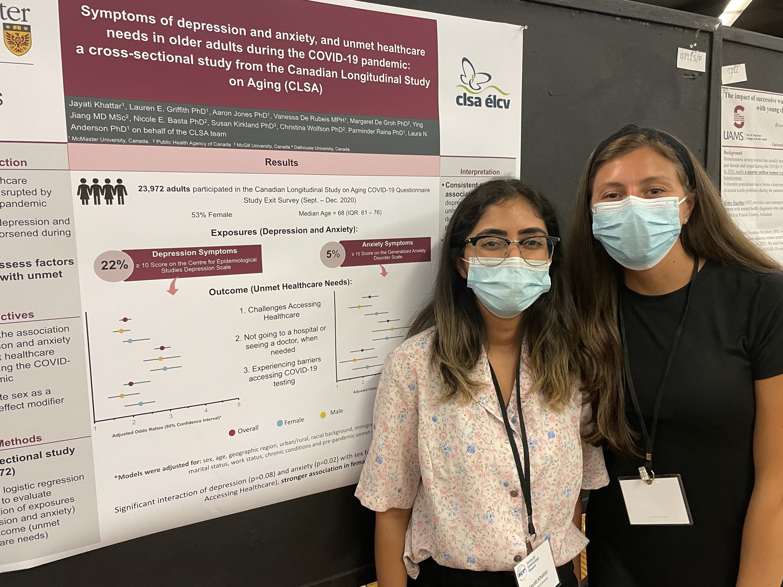 Jayati and Vanessa in front of Jayati's poster